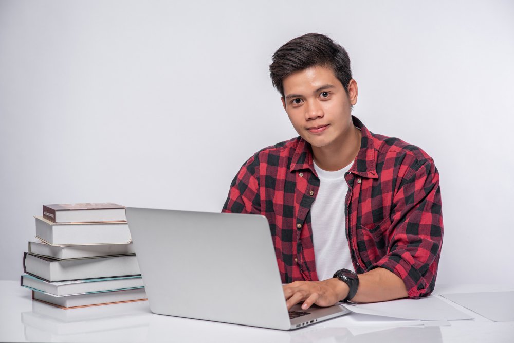 happy student with computer
